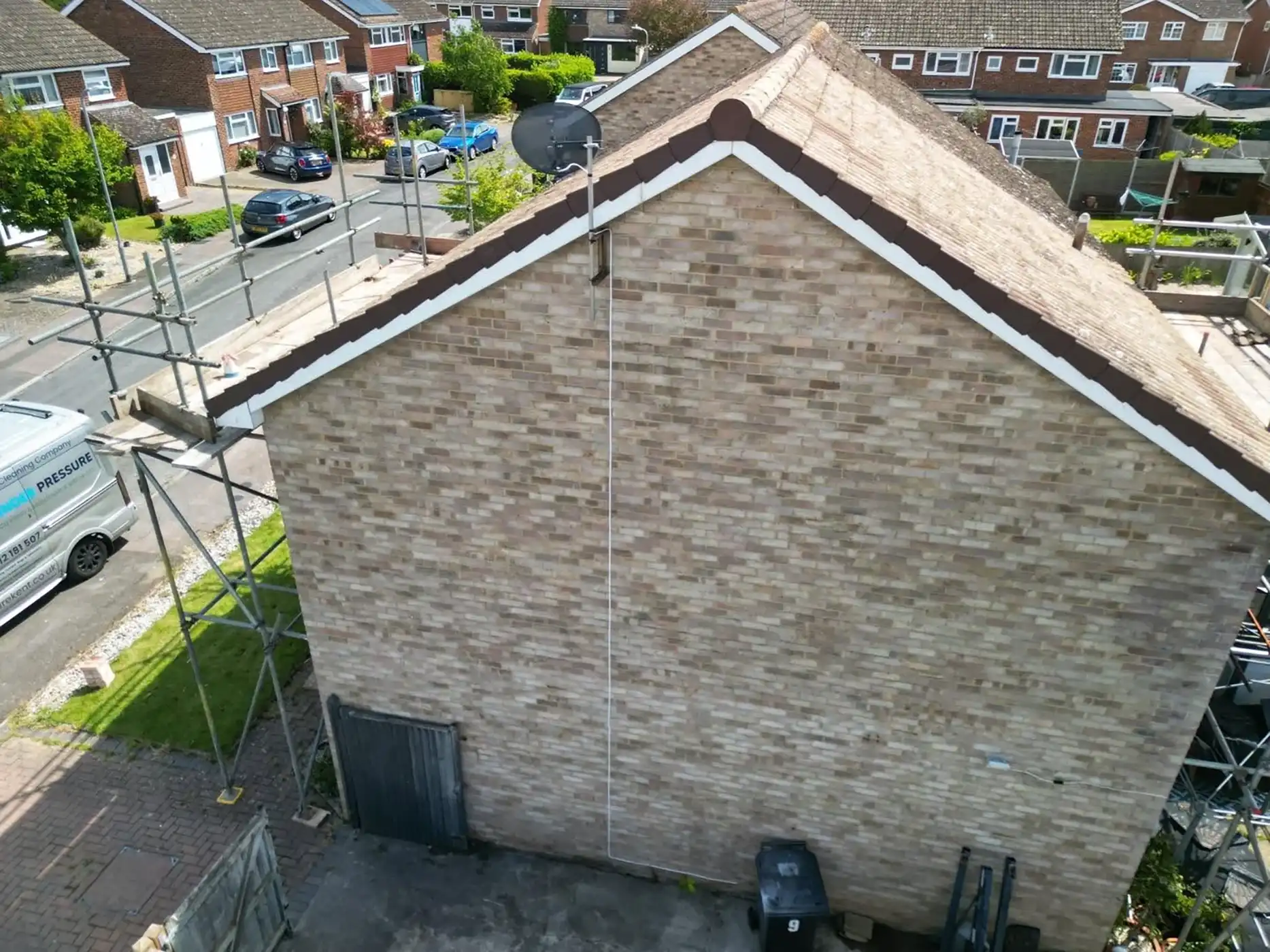 House with scaffolding on the outside.